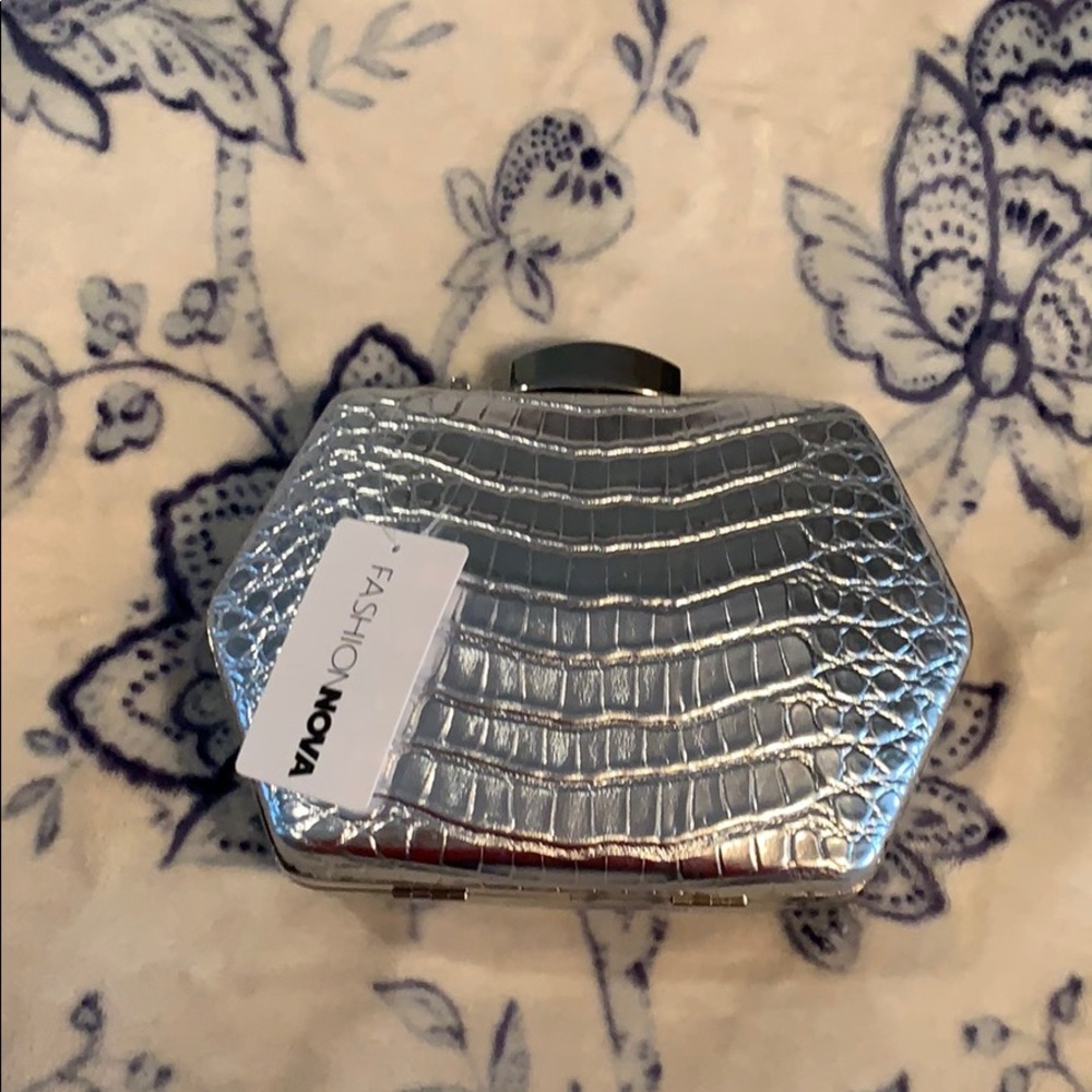 Brand new fashion nova silver clutch